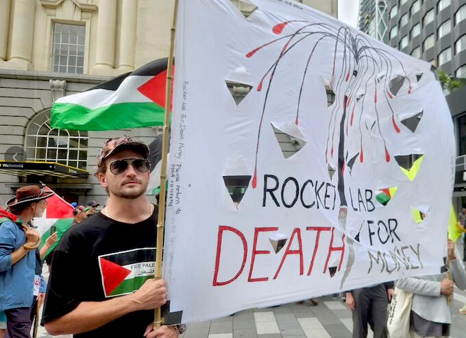 A “Rocket Lab = death for money” banner at today’s protest