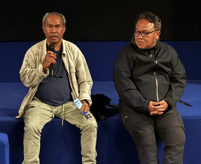 Film director Dandhy Dwi Laksono (right) and producer Victor Mambor