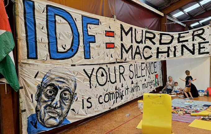 An "IDF = Murder Machine" banner at today's "Banners for Humanity" exhibition at the Corbans Art Centre